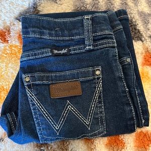 Girls wranglers size 8, mint condition! Dark blue and boot cut.